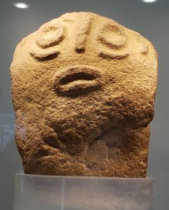 A humanoid figure with fish-like features on display at Lepenski Vir